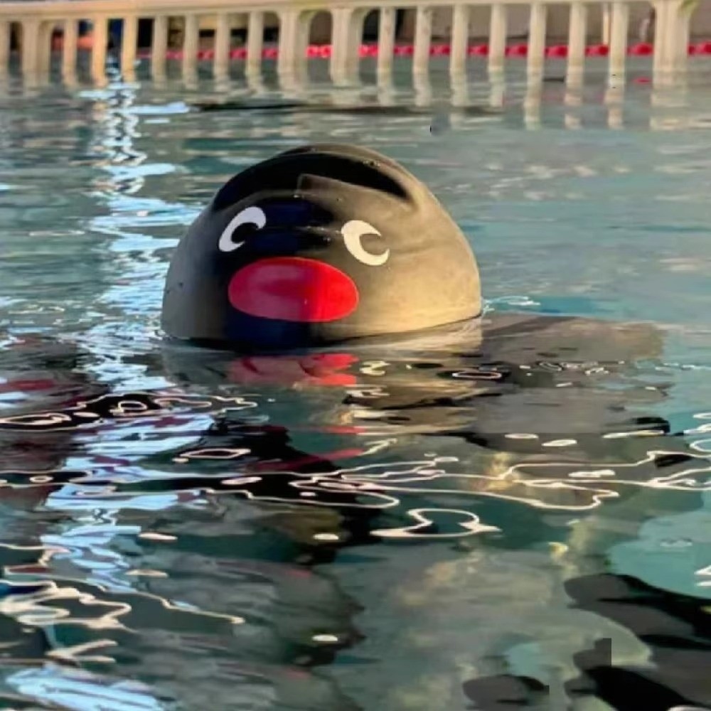 かわいい漫画弾性ペンギン水泳キャップ防水快適な水泳キャップ拡 - Aquatic Sports Cap のレビューと価格